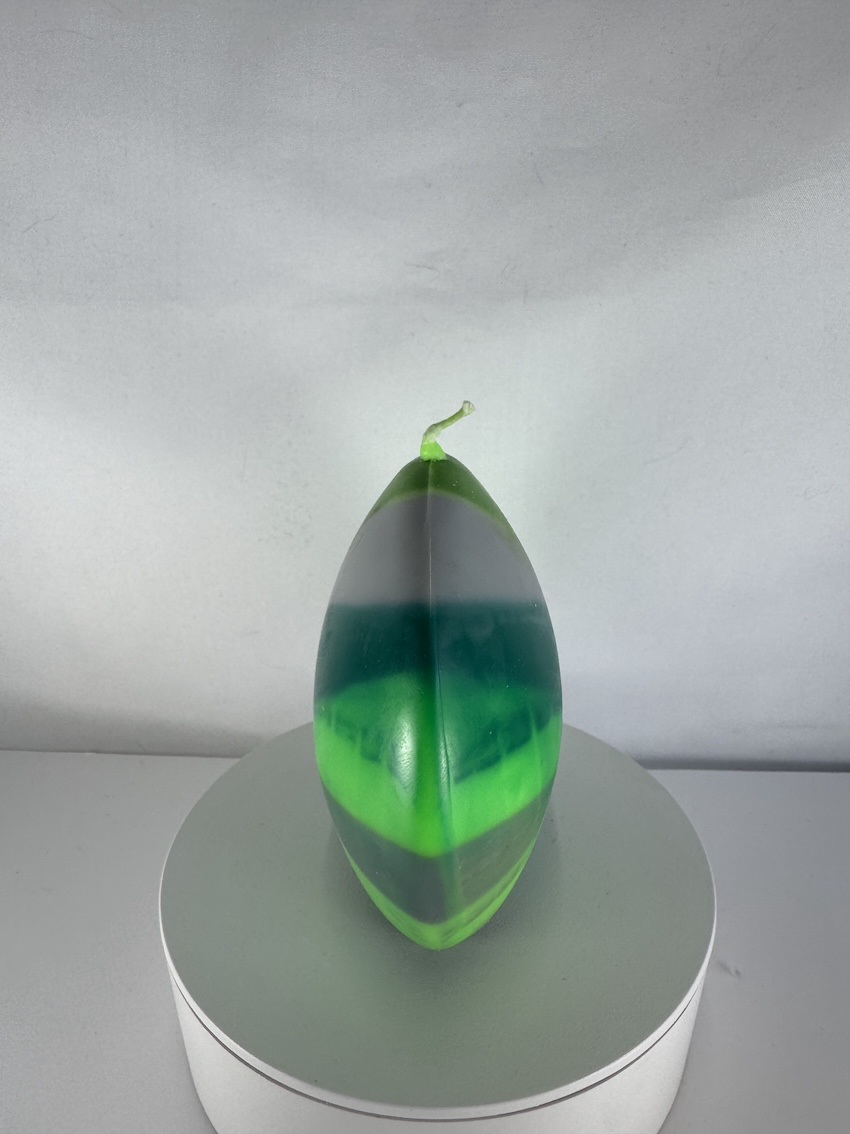 Bougie Disque Petit – Collection Chlorophylle Petite bougie verte en forme de disque, moulée, collection Chlorophylle