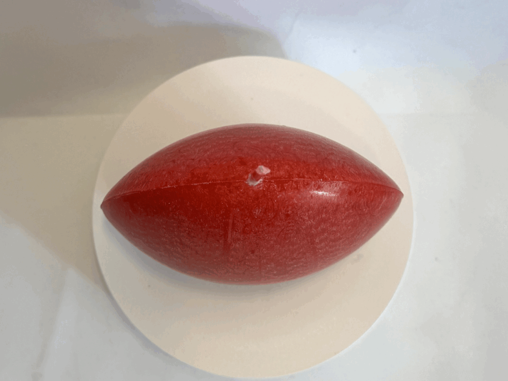 Bougie disque 10 cm en cire d’olive rouge — surface lisse et effets cristallisés