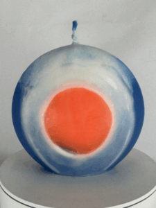 bougie disque œil orange et bleu en cire minérale — collection JOY