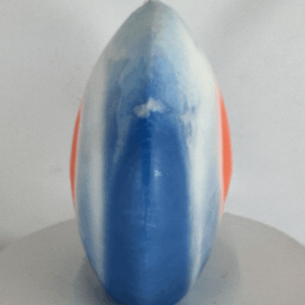 bougie disque œil orange et bleu en cire minérale — collection JOY