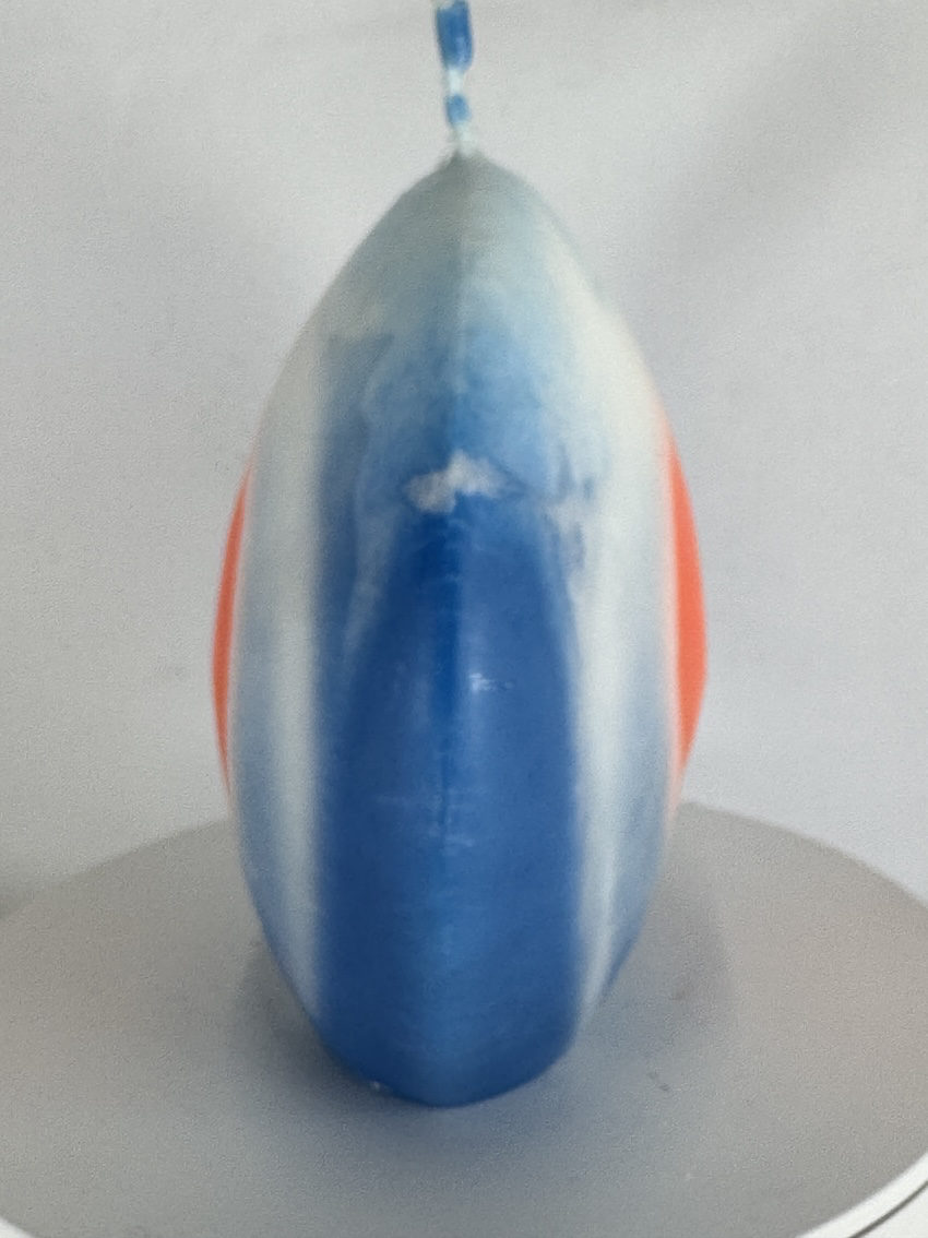 bougie disque œil orange et bleu en cire minérale — collection JOY