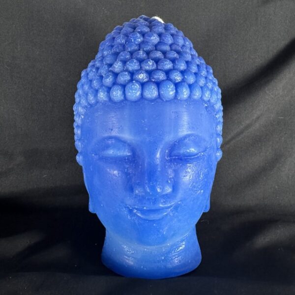 Bougie visage Bouddha bleu outremer en cire minérale, moulée à la main dans le canton de Vaud. Pièce sculpturale de plus de 1 kg, env. 100 h de combustion, finition lisse et lumineuse.